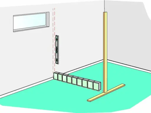 Byggare murar glasblock längs en vägg, med vattenpass och stöd.